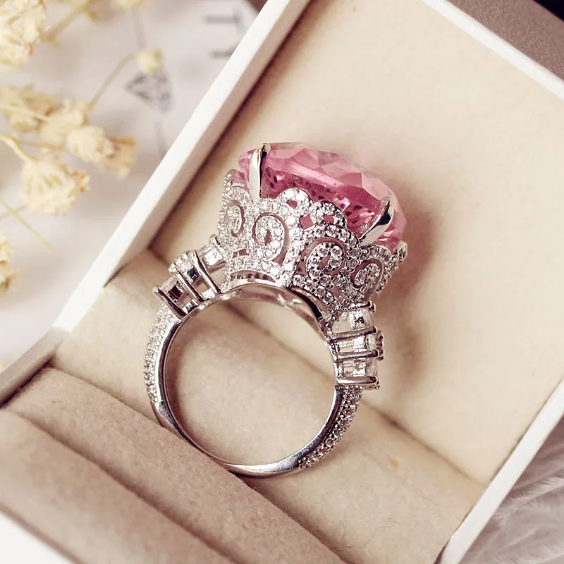 Stainless Steel Prong-Set Oval Engagement Ring with Rose Pink CZ