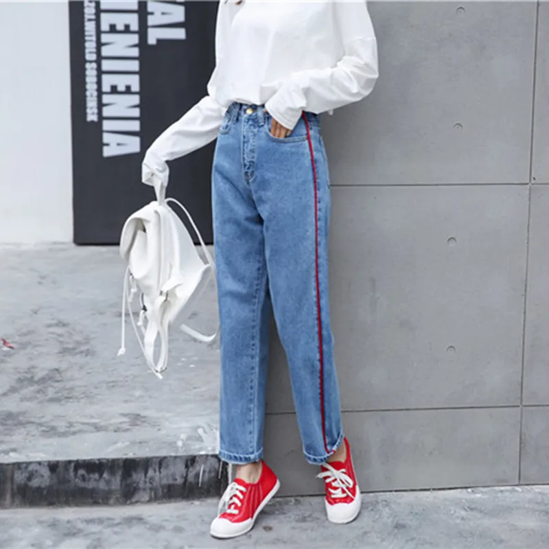 blue jeans with red and white stripe
