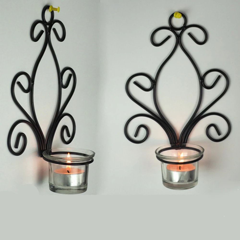 Iron Vertical Wall Hanging Candle Holder Sconce Accents Holds One Pillar Candle Each (Set of Two)Black with Antique Finish Iron Vertical Wall Hanging Candle Holder Sconce Accents Holds One Pillar Candle Each (Set of Two)Black with Antique Finish