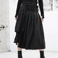 Cakucool осень Высокая талия Асимметричная плиссированные юбки сплошной черный Минимальный Novlety Дизайн гот средней длины юбки Для женщин