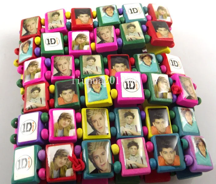 

Wholesale 12 pcs New 1D One 1 direction Wood Stretch bracelets Colors Mix