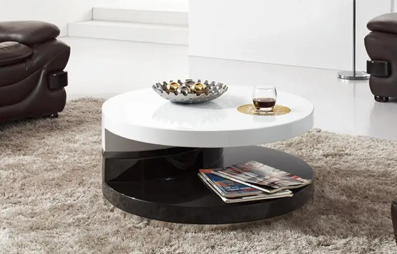 Simple small family. Round tea table. Table of black and white of the lacquer that bake sale