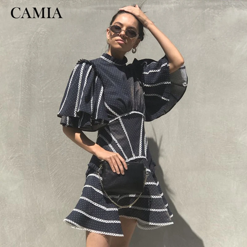

https://www.aliexpress.com/item/TWOTWINSTYLE-Sexy-Backless-Dresses-Women-Stand-Collar-Short-Sleeve-High-Waist-Patchwork-Lace-Pol