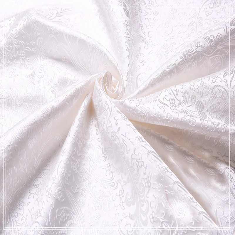 white brocade fabric