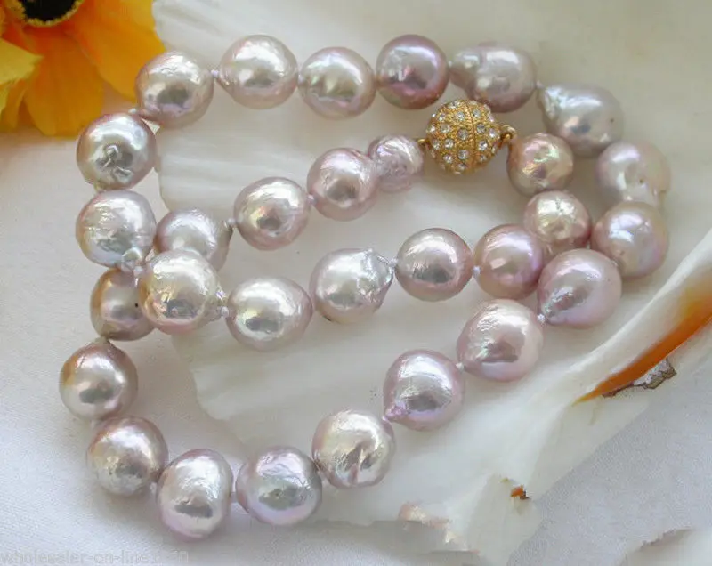 

Hot sale new Style >>>>>Unusual Real Natural 10-11mm Purple Baroque Freshwater Pearl Necklace 18