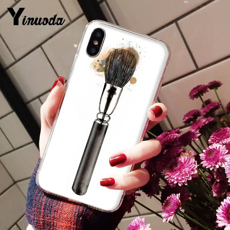 Beautiful girl's makeup brush painting