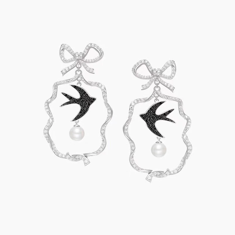 

Local focal simple design bowknot swallow Drop Earrings