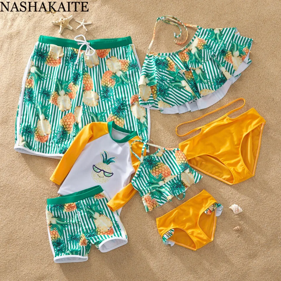 

NASHAKAITE Family Matching Clothes 2019 Stripe Pineapple Print Mom and Daughter Bikini Boy Clothing Set Men Shorts Family Look