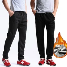 Uwback зимние брюки тренировочные Мужчины Твердые толстые Хлопковые Штаны для бега эластичная талия Свободные Повседневные Брюки Homme плюс размер 4XL XA261