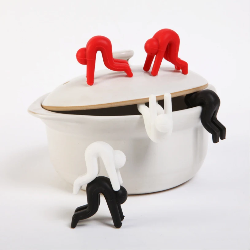 

2pcs/lot raise the lid spill prevention device to prevent overflowing soup kitchen tools mobile phone support Chopsticks bracket