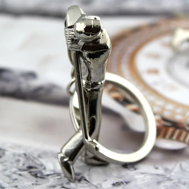 

playing golfer key chain