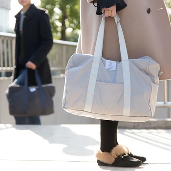 

Home hand-held foldable travel and reception bag tour canvas clothes large waterproof clothing and nano bag