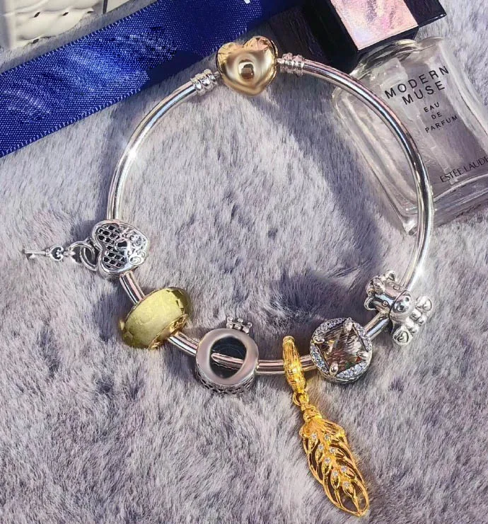 

Original 100% 925 Silver Charm High Quality Golden Feather Unico Women Charm Copy Jewelry For WomenGift 1:1 With Logo Bracelet
