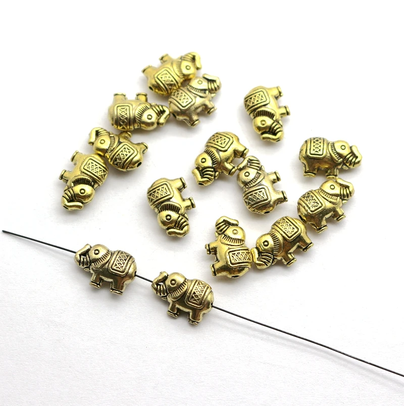 

10 pcs / lot Wholesale Charms Cute Elephant Animal Beads Metal Spacer Beads Zinc Alloy Antique Beads for DIY Jewelry Making