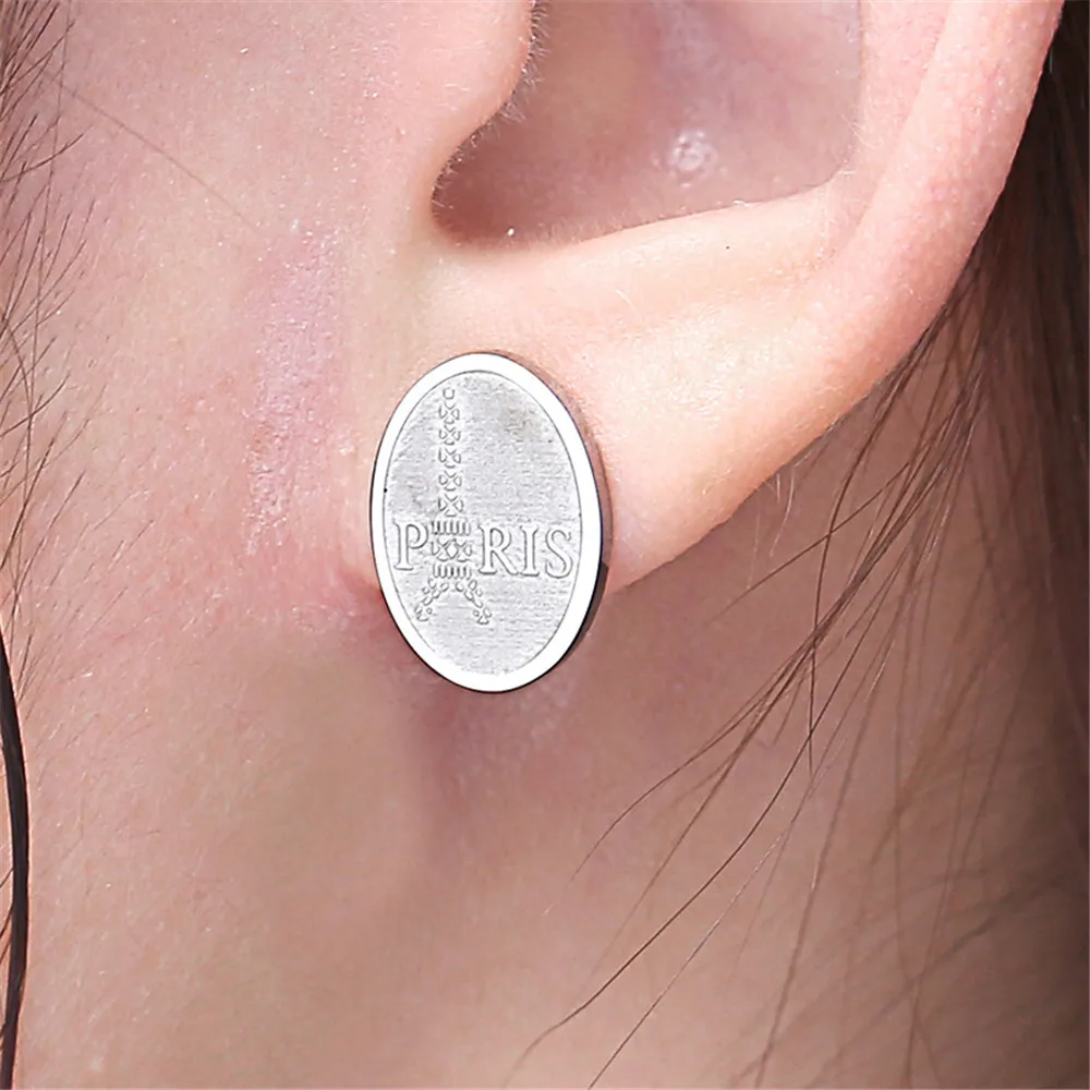 

Silver earrings fashion jewelry Vintage Coin Earrings for woman Paris Eiffel Tower Carved Round Stainless Steel Stud Earrings