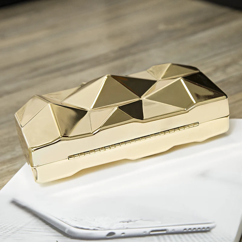 An Acrylic Box Geometric Clutch with a geometric design on it.