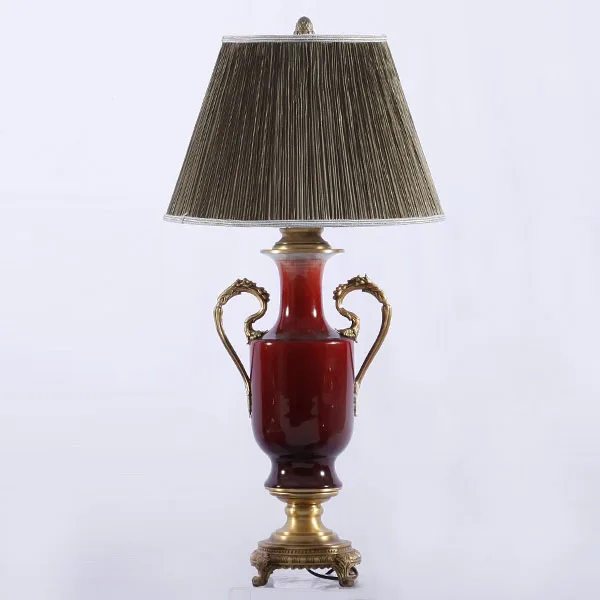 Exalted and elegant red burgundy ceramic matching brass carving art