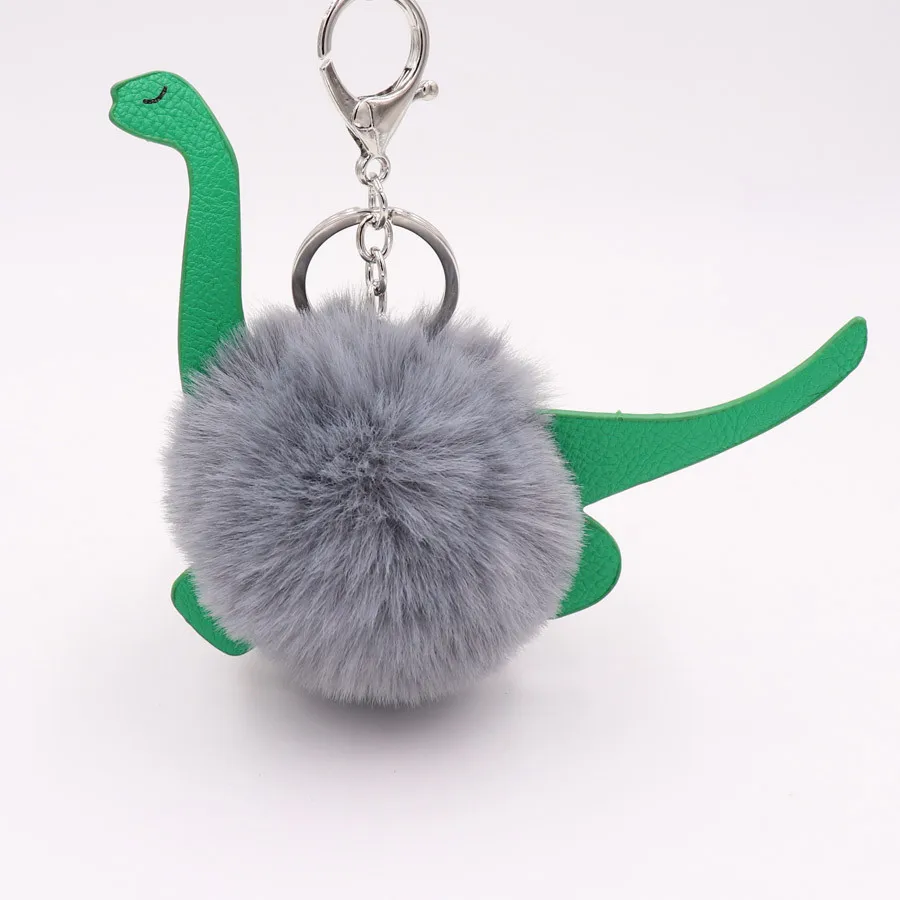 

Cute dinosaur Keychain Pompons Keychains Fur Keychain Fluffy Key Chains for Cars Keyrings Trinkets Pom Pom Keychain