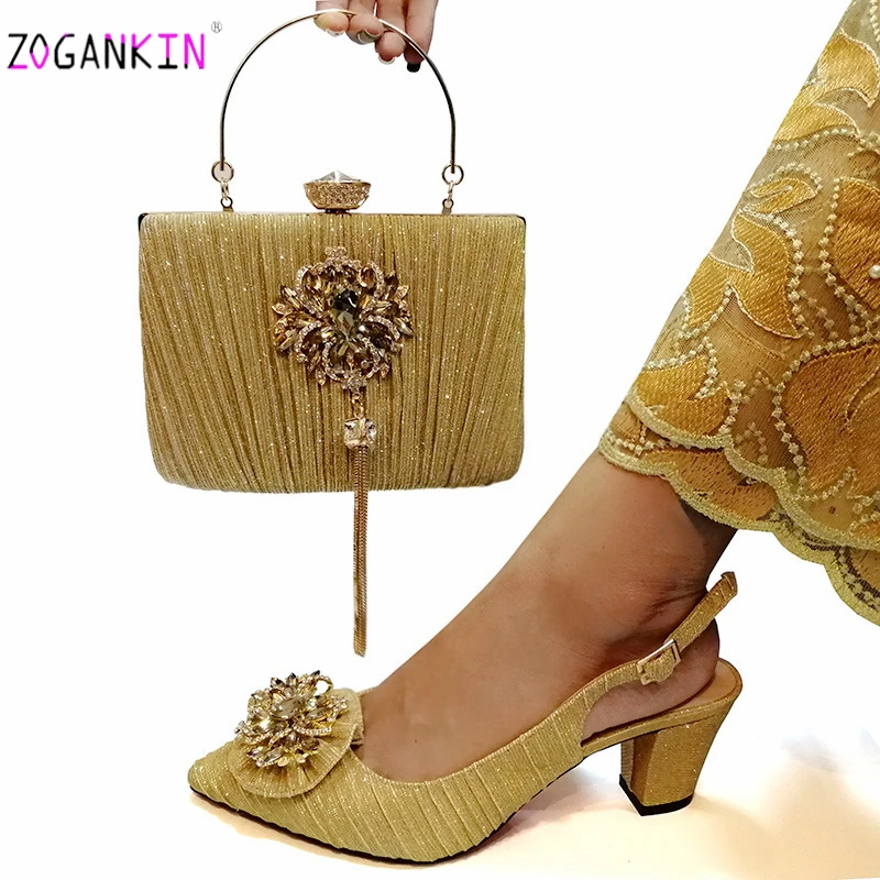 gold heels and clutch