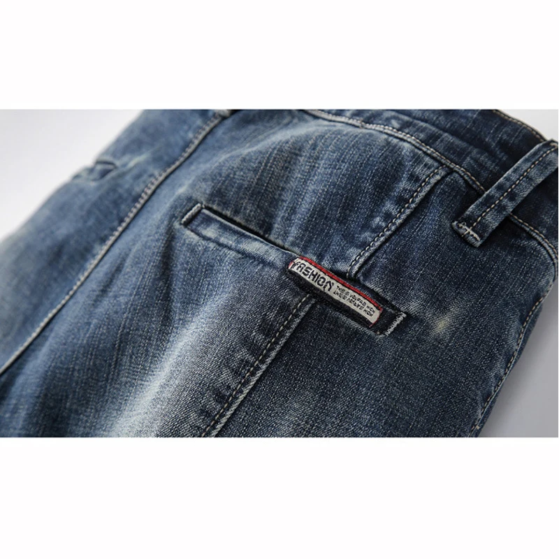 LEOCLOTHO Korea Style Elasticity Jeans Men Slim Fit Pencil Pants Fashion Casual Harem Pants Men Trousers