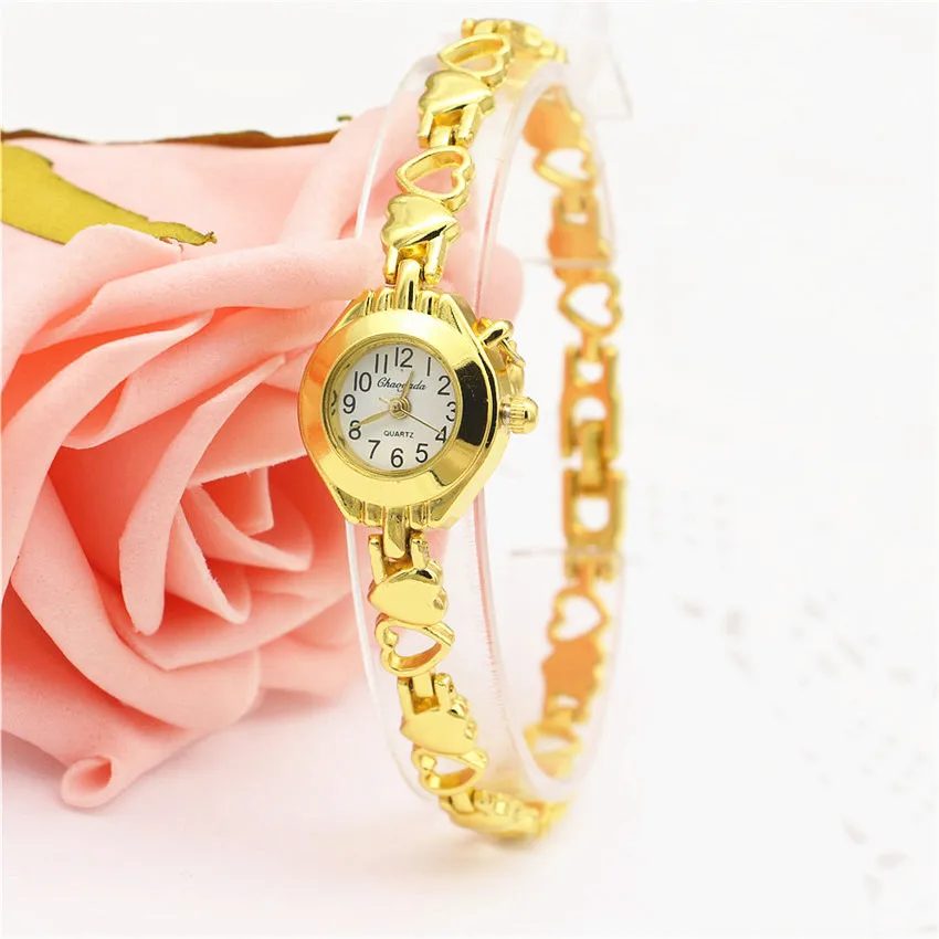 

Women Watches 2016 Luxury Heart Pendant Bracelet Clock Women Wrist Fashion Ladies Dress Quartz Wristwatches Montre Femme Saat
