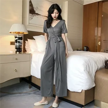 

Solid color retro fashion jumpsuit new simple slim high waist elegant V neck pendant full of nine belts thin section jumpsuit
