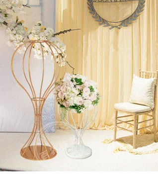 

large and tall gold or white candelabra centerpieces for wedding and events
