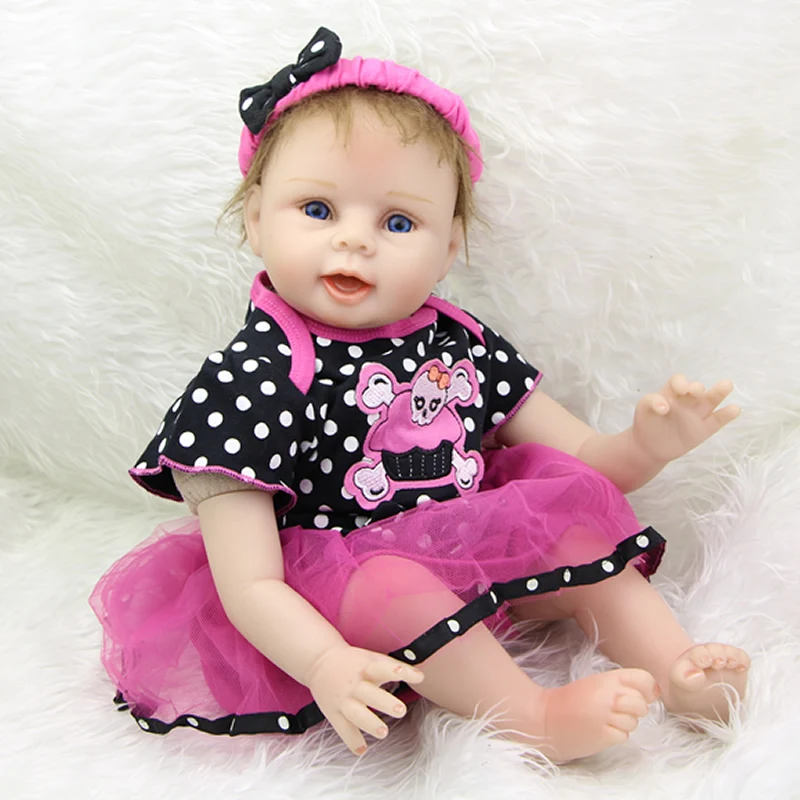 

Silicone Vinyl Reborn Baby Doll 22 Inch Truly Real Lifelike Babies Wearing Skull Dress Kids Birthday Gift Free Magnet Pacifier