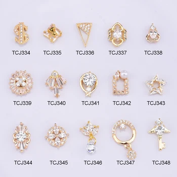 

5pcs metal nail art crystal diamond Zircons nail decorations new arrive Star dollar symbol 3d nailart jewelry crown TCJ334~348