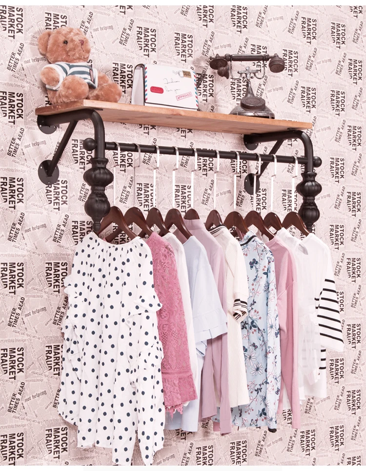 Clothes store hangers display rack The Wall wrought iron solid wood wall-mounted Textile Gondola clothes hangers side hangers.