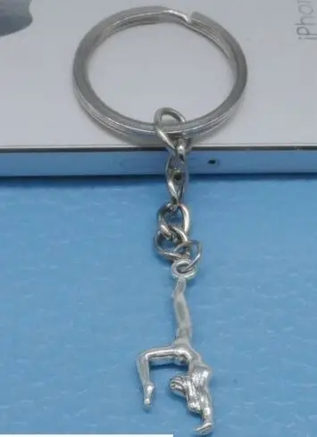 

Free Ship 1pcs Silver Plated Metal Gymnastics sporter Key Ring Keychain Jewelry