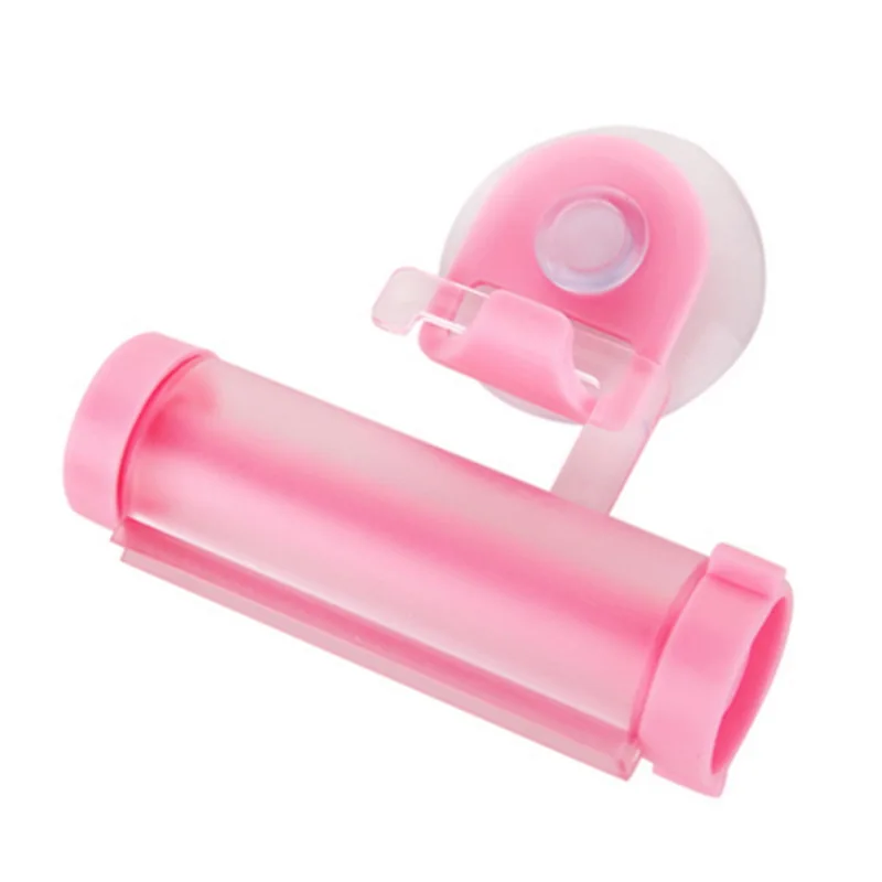 Rolling Squeezer Toothpaste Dispenser Tube Sucker Holder Dental Cream Bathroom Accessories Manual Syringe Dispenser Gadgets - Color: Pink