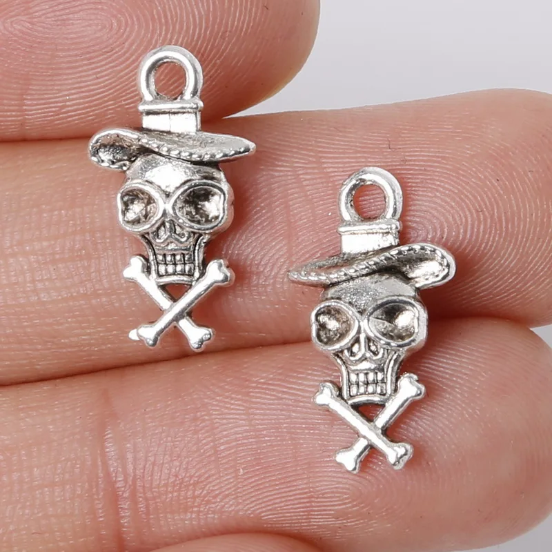 

Top Quality 11Pcs 10*18mm Zinc Alloy Antique Silver Plated Skull Head Charms Pendants Jewelry Findings For Necklace Braclets