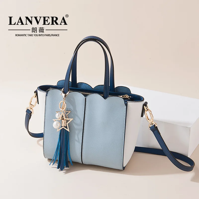 

The first layer of leather fringed shoulder 2017 new fashion PRAD handbag on behalf of a leather bag