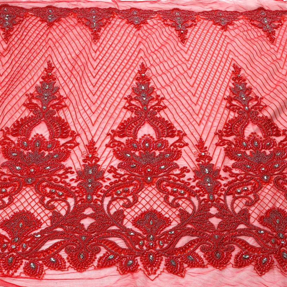 Nieuwe mode stijl off white/rood/goldheavy handgemaakte kralen op netting geborduurde trouwjurk/avondjurk kant stof tuin Nieuwe mode stijl off white/rood/goldheavy handgemaakte kralen op netting geborduurde trouwjurk/avondjurk kant stof tuin