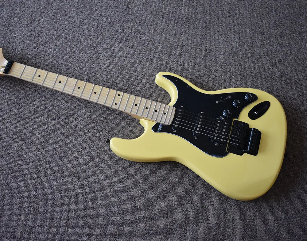 

Factory custom yellow Tremolo electric guitar with black guard, maple fingerboard, SSH pickup, custom service.