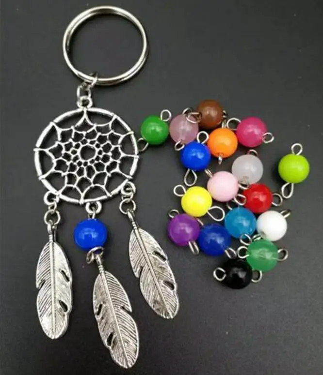

1 Pcs/Lot Mixed color glass beads dreamcatcher keyring bag charm fashion boho style jewelry feather keychain for women