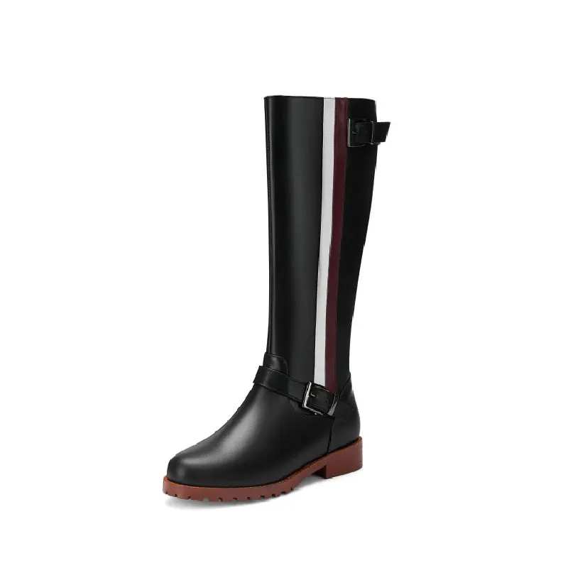 

Flat and spelled cowhide boots