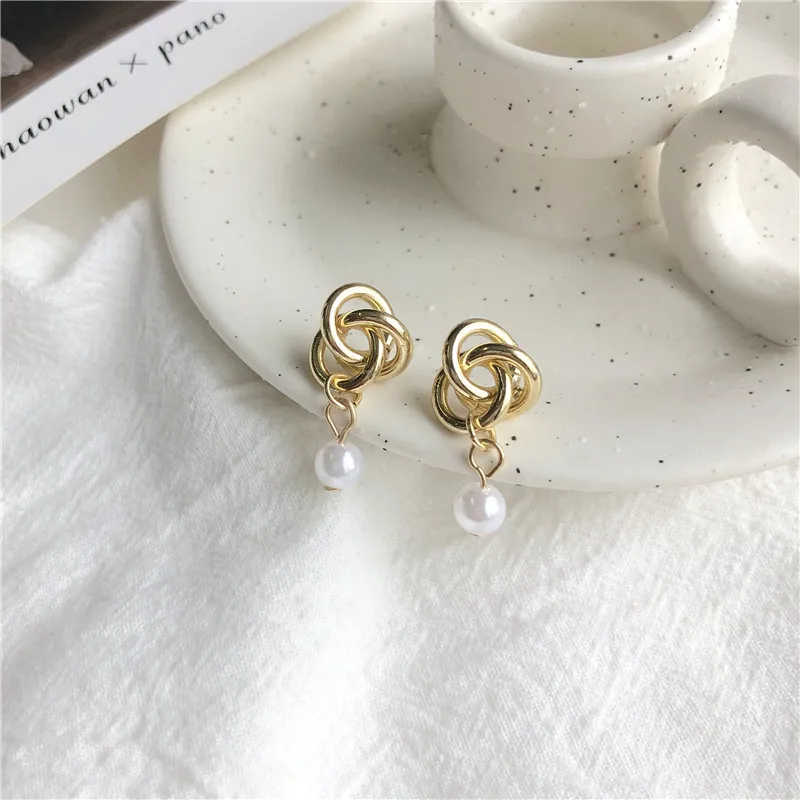 

S925 Silver Needle South Korea East Gate Minimal Metal Tie Stitching Pearl Ear Nail Girl Net Red ins Earrings 726