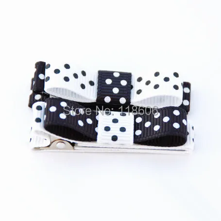 black grosgrain with white swiss dots and white grosgrain with black swiss dots.jpg