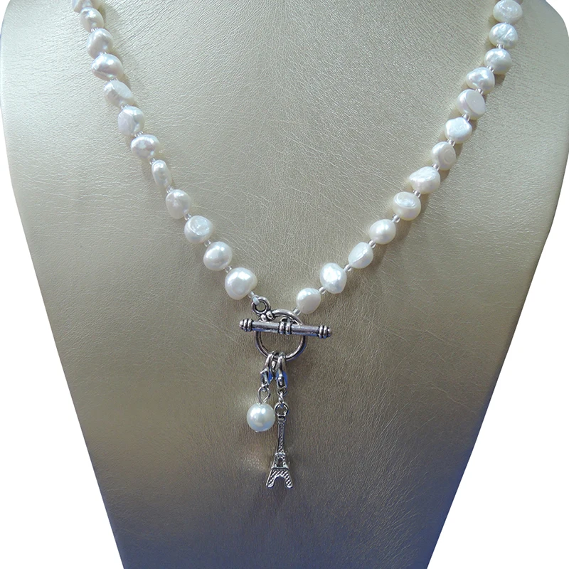 

100% NATURE FRESHWATER PEARL NECKLACE WITH NICE Crown and Eiffel tower pendant .