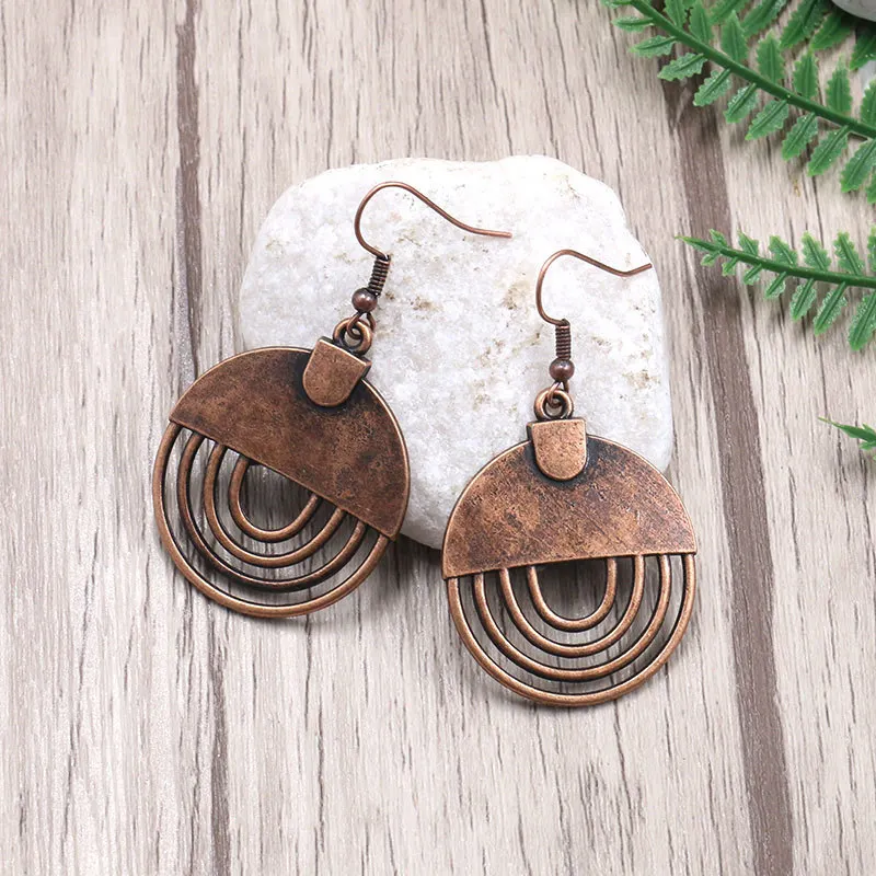 

Women Bohemia Copper Red Round Drop Earrings For Women Circle Charm Pendant Retro Hollow Design Bohemia Alloy Vintage Earring