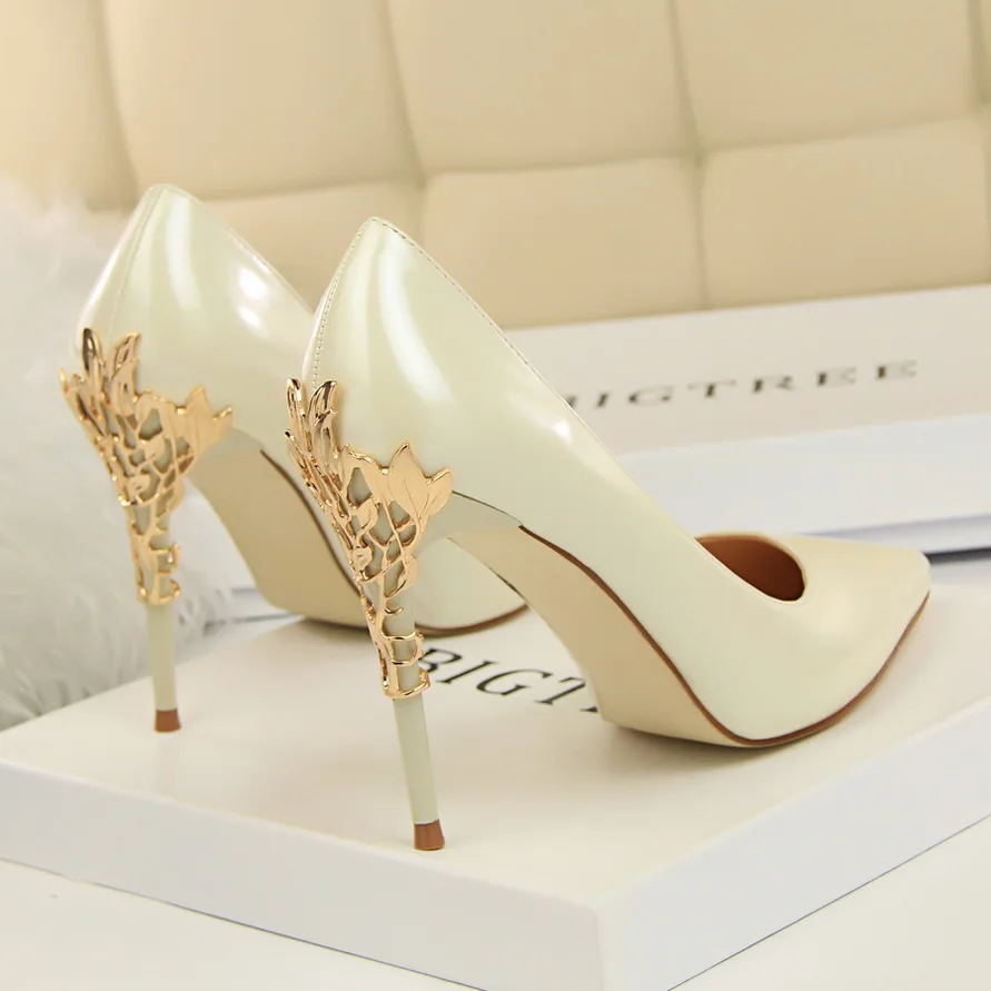 white and gold pumps