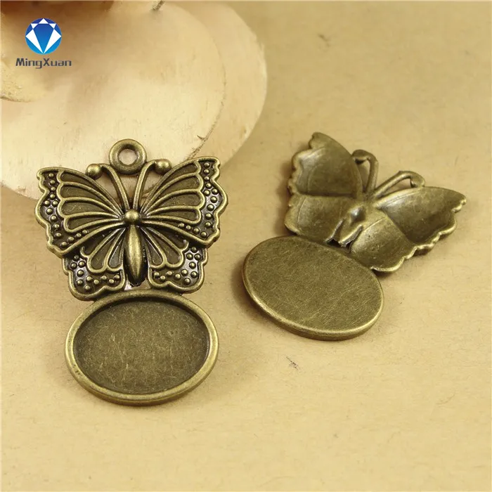 

MINGXUAN 20pcs/lot wholesale Pendant jewelry Findings Antique Bronze butterfly 14*10 mm Zinc Alloy Cameo Tray C728
