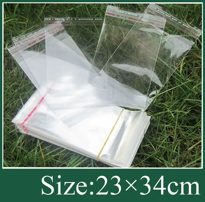clear Poly Bag for packing clothing (23x34cm) with adhesive seal for
