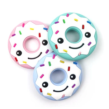 

Baby teether donut teething toy cute silicone to reduce drooling non-toxic to relieve dental discomfort