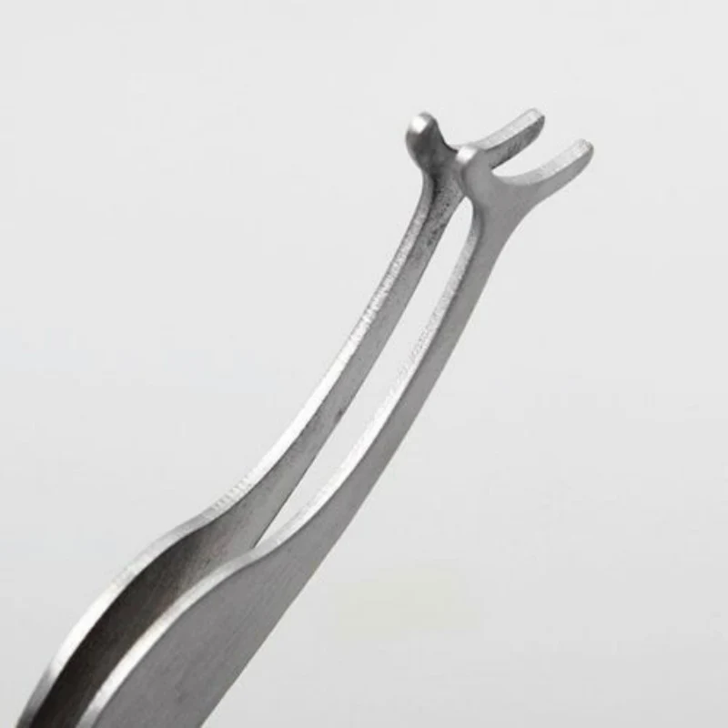 

Multifunctional False Eyelashes Remover Stainless Steel Auxiliary Eyelash Curler Tweezers Clip 1pcs