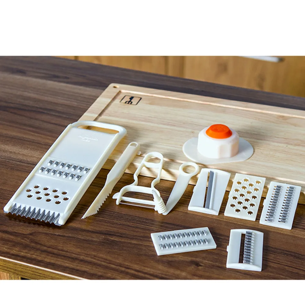 

ISHOWTIENDA Multi-Function 12-Piece Cutlery Peeling Planing Cucumber Slices Potato Shredded