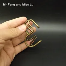 С буквой «М» и Форма небольшой Размеры коричневый Цвет Metal Ring Puzzle Брайан Дразнилка ум гаджет Развивающая игра игрушки для детей