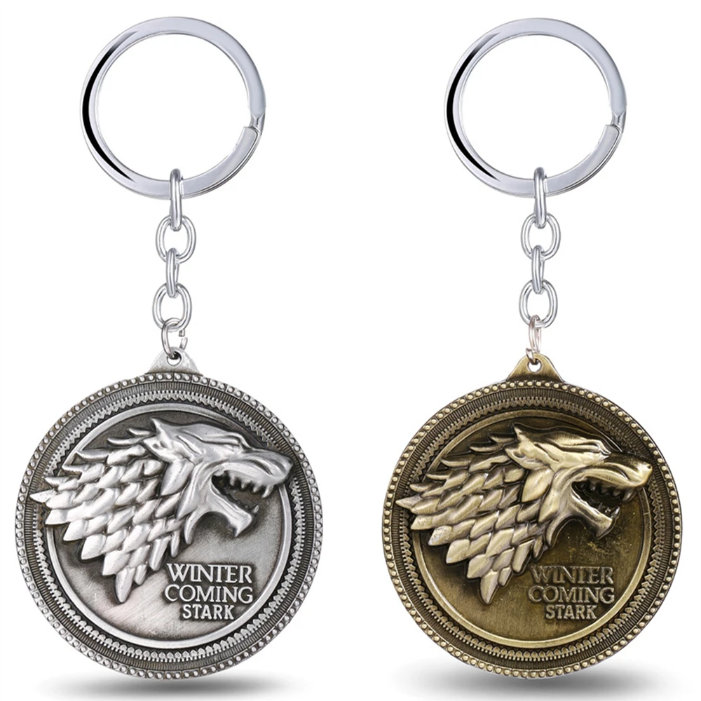

Game Of Thrones House Stark Keychain Necklace Figure Wolf Head Symbol Keyring Pendants Winter is Coming Cosplay Necklace Figure